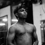 a-man-flexing-body